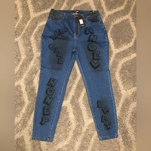 FASHION NOVA WORK OF ART GRAPHITTI SKINNY JEANS